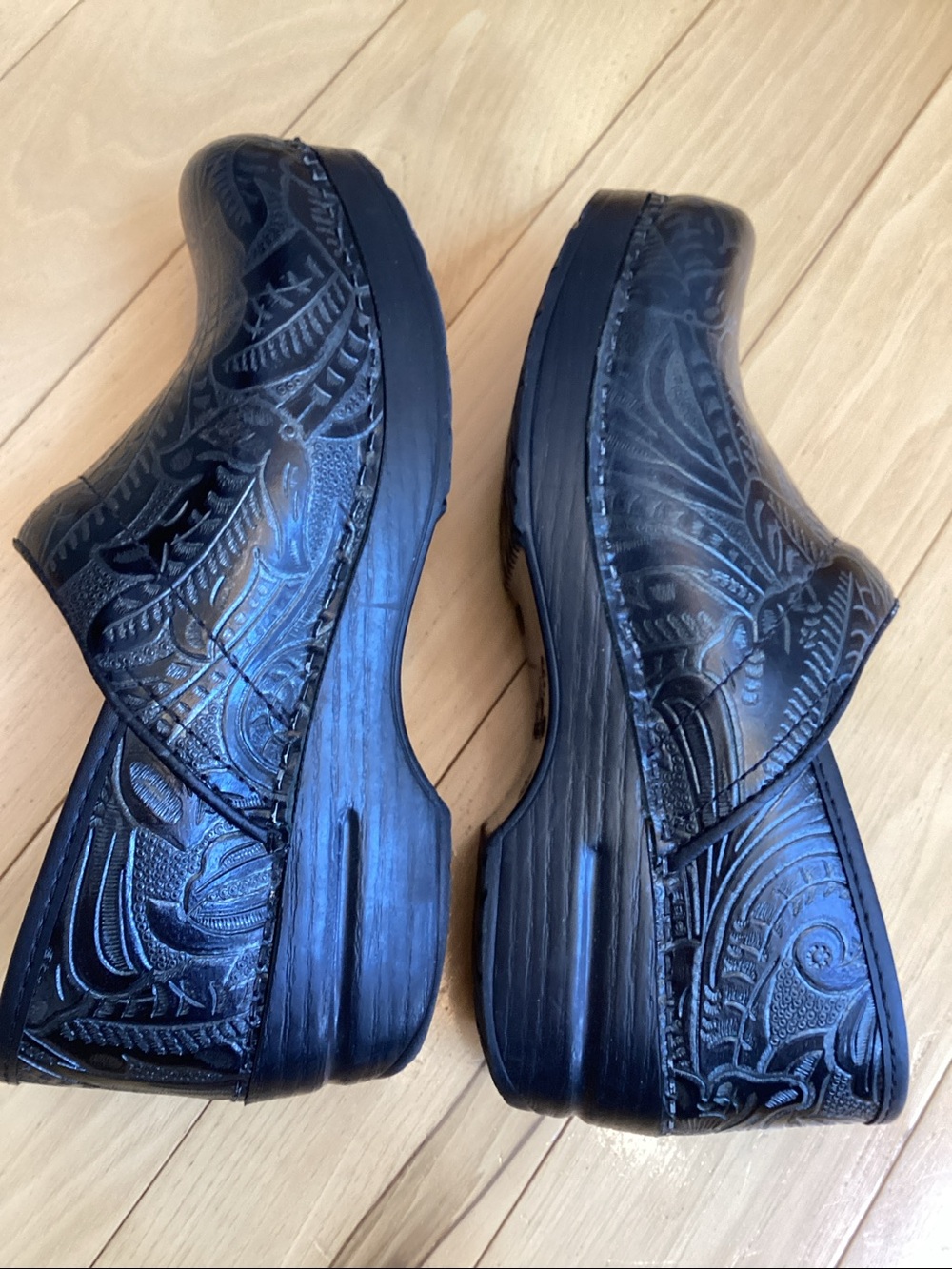 Dansko black tooled leather professional clogs. Women’s size 38 (7.5-8)